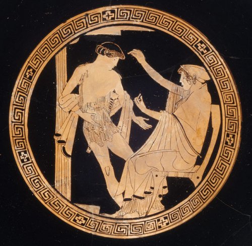 Teseu recebido de volta por Atenas após a morte do Minotauro. Fundo de vaso Cílice. Cerca de 480 a.C. MET. 53.11.4